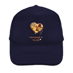 Trucker's hat with sourdough makings in a heart with a message
